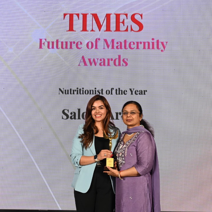 Saloni holding the Nutritionist of the Year trophy at the Times Future of Maternity Awards
